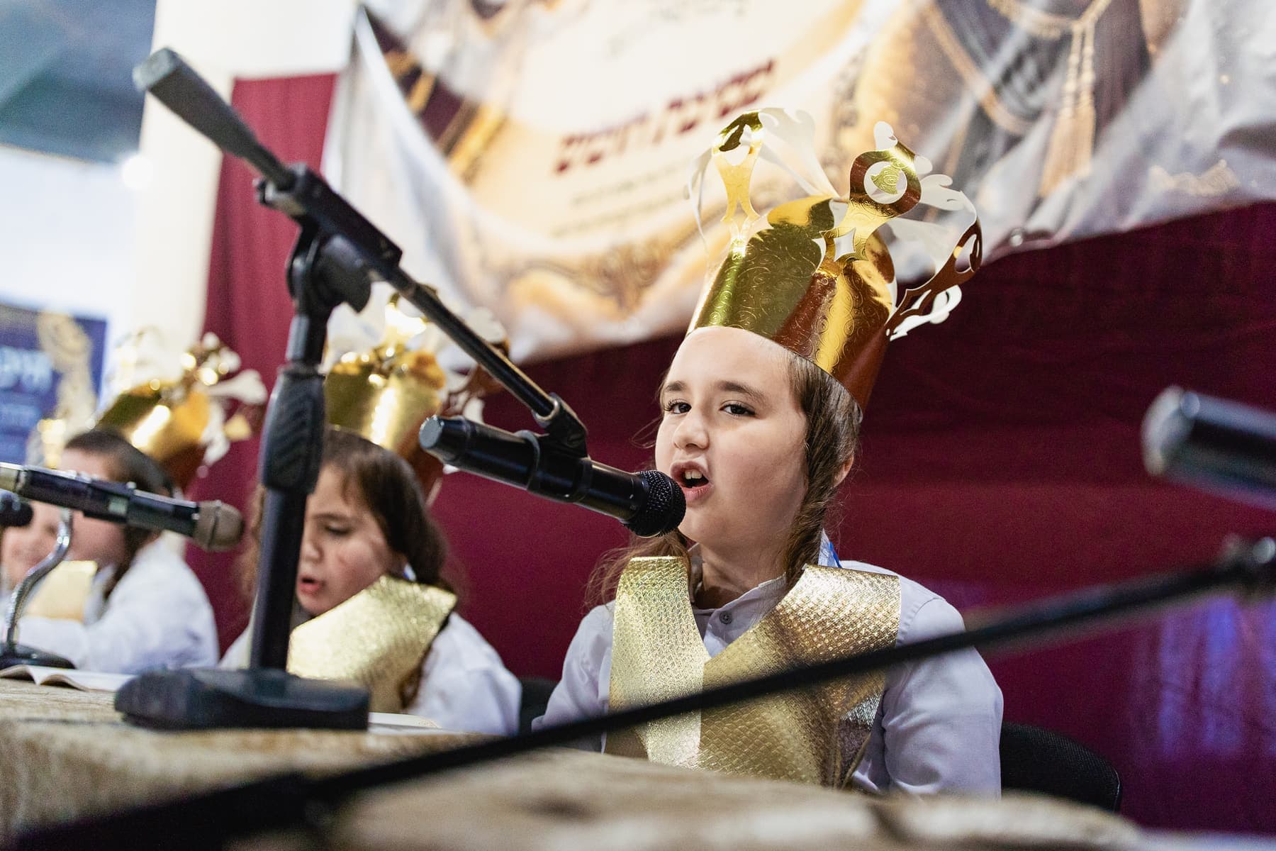 Students wearing gold crowns at the Chumash celebration
